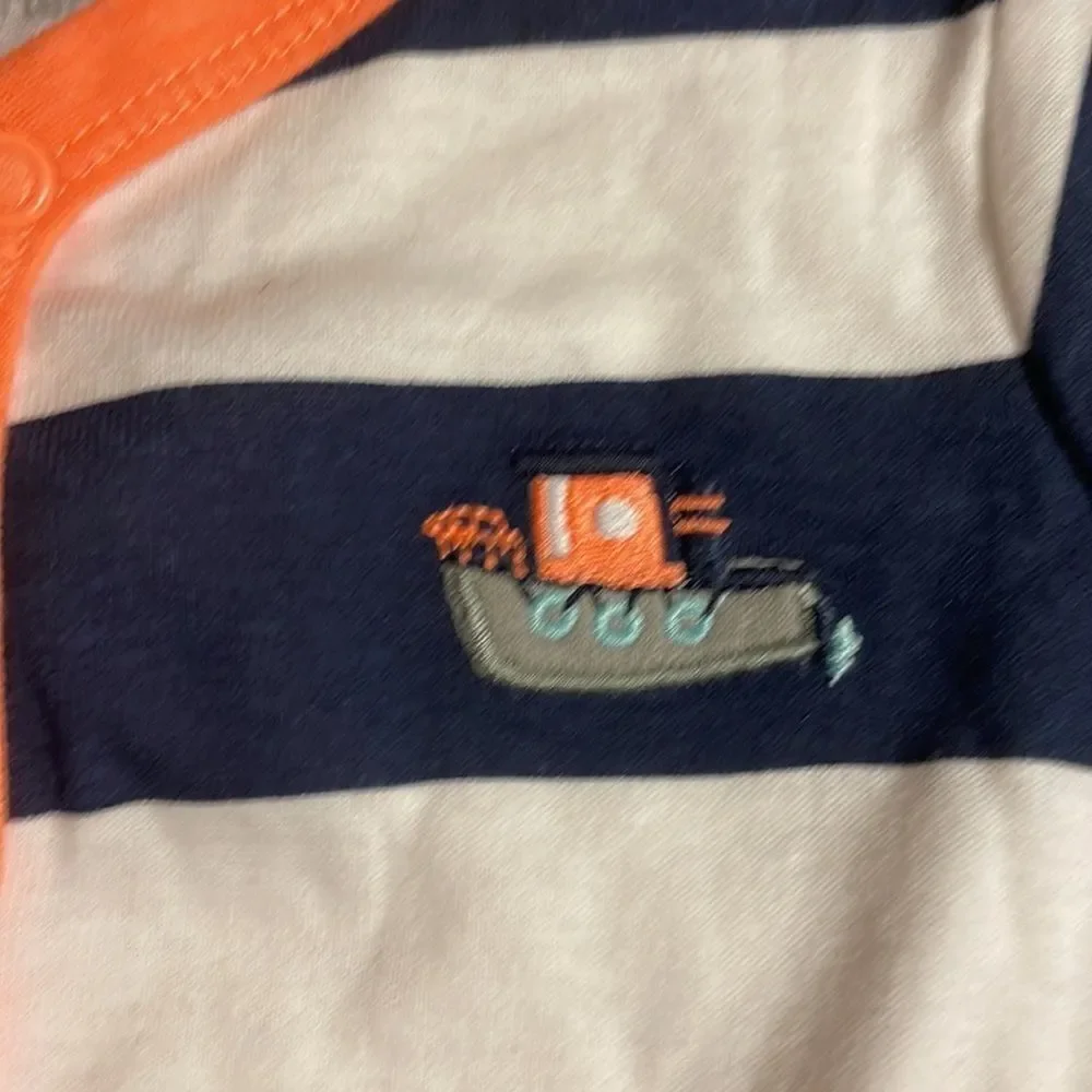 Carters boy navy blue and white striped onesie.